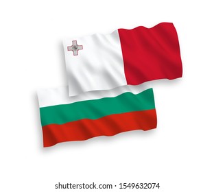 National vector fabric wave flags of Bulgaria and Malta isolated on white background. 1 to 2 proportion.