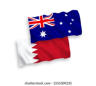 National vector fabric wave flags of Australia and Bahrain isolated on white background. 1 to 2 proportion.