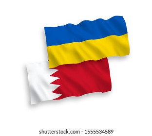 National vector fabric wave flags of Bahrain and Ukraine isolated on white background. 1 to 2 proportion.