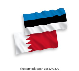 National vector fabric wave flags of Estonia and Bahrain isolated on white background. 1 to 2 proportion.