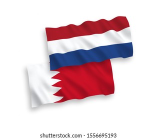 National vector fabric wave flags of Bahrain and Netherlands isolated on white background. 1 to 2 proportion.
