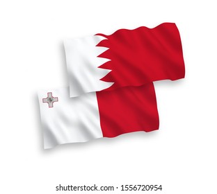 National vector fabric wave flags of Malta and Bahrain isolated on white background. 1 to 2 proportion.