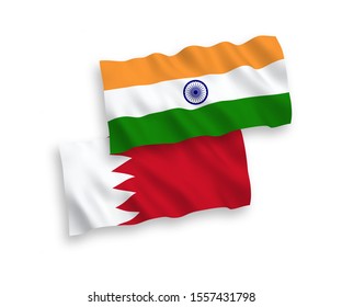 National vector fabric wave flags of India and Bahrain isolated on white background. 1 to 2 proportion.