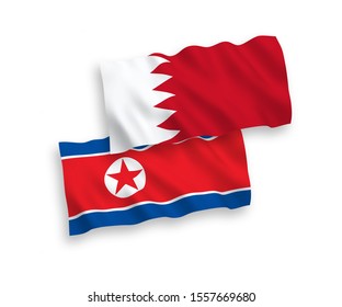 National vector fabric wave flags of North Korea and Bahrain isolated on white background. 1 to 2 proportion.