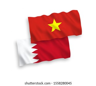 National vector fabric wave flags of Bahrain and Vietnam isolated on white background. 1 to 2 proportion.