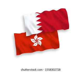 National vector fabric wave flags of Bahrain and Hong Kong isolated on white background. 1 to 2 proportion.