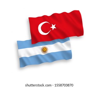 National vector fabric wave flags of Turkey and Argentina isolated on white background. 1 to 2 proportion.