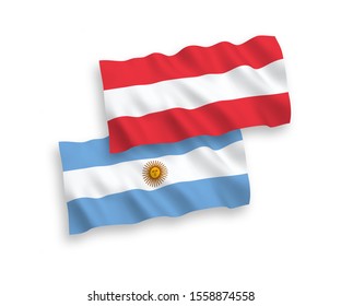 National vector fabric wave flags of Austria and Argentina isolated on white background. 1 to 2 proportion.