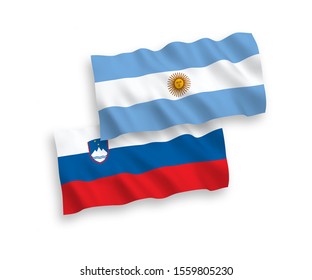 National vector fabric wave flags of Slovenia and Argentina isolated on white background. 1 to 2 proportion.