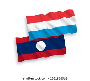 National vector fabric wave flags of Laos and Luxembourg isolated on white background. 1 to 2 proportion.