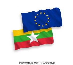 National vector fabric wave flags of European Union and Myanmar isolated on white background. 1 to 2 proportion.