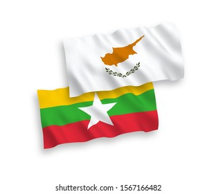 National vector fabric wave flags of Cyprus and Myanmar isolated on white background. 1 to 2 proportion.
