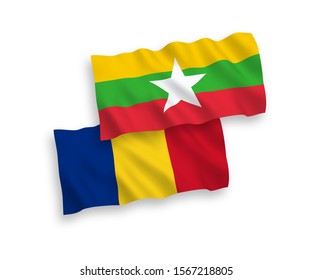 National vector fabric wave flags of Romania and Myanmar isolated on white background. 1 to 2 proportion.