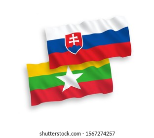 National vector fabric wave flags of Slovakia and Myanmar isolated on white background. 1 to 2 proportion.