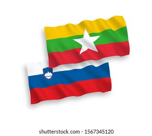 National vector fabric wave flags of Slovenia and Myanmar isolated on white background. 1 to 2 proportion.