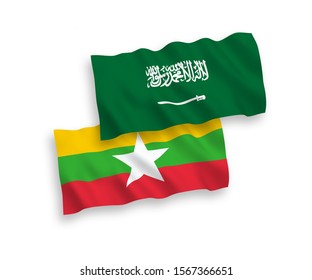 National vector fabric wave flags of Saudi Arabia and Myanmar isolated on white background. 1 to 2 proportion.