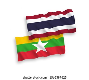 National vector fabric wave flags of Myanmar and Thailand isolated on white background. 1 to 2 proportion.