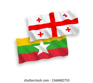 National vector fabric wave flags of Myanmar and Georgia isolated on white background. 1 to 2 proportion.