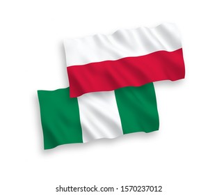 National vector fabric wave flags of Nigeria and Poland isolated on white background. 1 to 2 proportion.