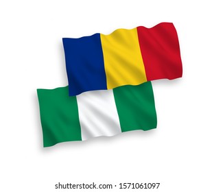 National vector fabric wave flags of Romania and Nigeria isolated on white background. 1 to 2 proportion.