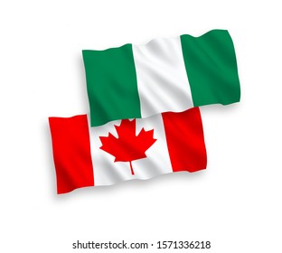 National vector fabric wave flags of Canada and Nigeria isolated on white background. 1 to 2 proportion.