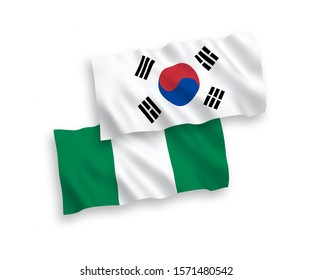 National vector fabric wave flags of South Korea and Nigeria isolated on white background. 1 to 2 proportion.