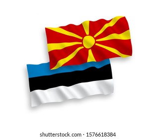 National vector fabric wave flags of Estonia and North Macedonia isolated on white background. 1 to 2 proportion.