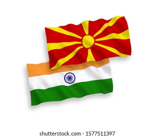 National vector fabric wave flags of India and North Macedonia isolated on white background. 1 to 2 proportion.