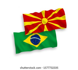 National vector fabric wave flags of Brazil and North Macedonia isolated on white background. 1 to 2 proportion.