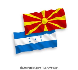 National vector fabric wave flags of North Macedonia and Honduras isolated on white background. 1 to 2 proportion.