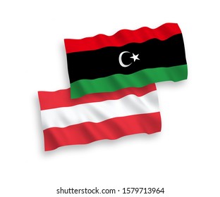 National vector fabric wave flags of Austria and Libya isolated on white background. 1 to 2 proportion.