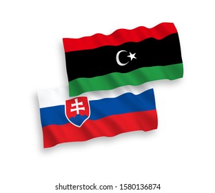 National vector fabric wave flags of Slovakia and Libya isolated on white background. 1 to 2 proportion.