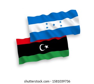 National vector fabric wave flags of Libya and Honduras isolated on white background. 1 to 2 proportion.