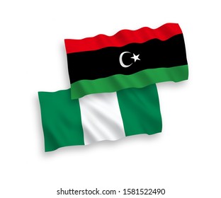 National vector fabric wave flags of Libya and Nigeria isolated on white background. 1 to 2 proportion.