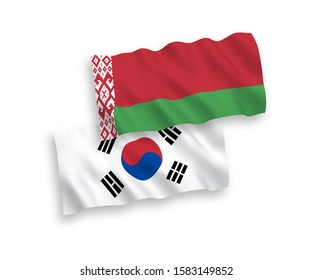 National vector fabric wave flags of South Korea and Belarus isolated on white background. 1 to 2 proportion.