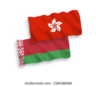National vector fabric wave flags of Belarus and Hong Kong isolated on white background. 1 to 2 proportion.
