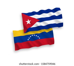 National vector fabric wave flags of Venezuela and Cuba isolated on white background. 1 to 2 proportion.