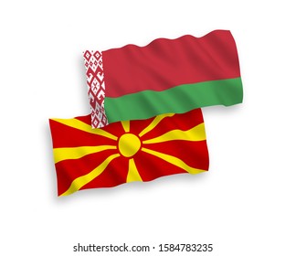 National vector fabric wave flags of Belarus and North Macedonia isolated on white background. 1 to 2 proportion.