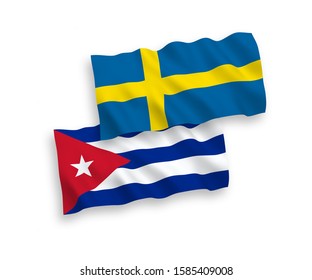 National vector fabric wave flags of Sweden and Cuba isolated on white background. 1 to 2 proportion.