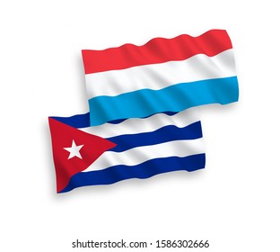 National vector fabric wave flags of Cuba and Luxembourg isolated on white background. 1 to 2 proportion.