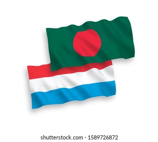 National vector fabric wave flags of Bangladesh and Luxembourg isolated on white background. 1 to 2 proportion.