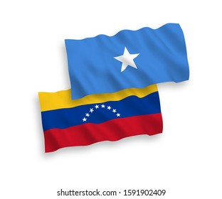 National vector fabric wave flags of Venezuela and Somalia isolated on white background. 1 to 2 proportion.