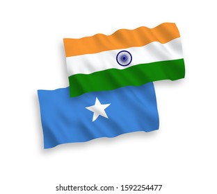 National vector fabric wave flags of India and Somalia isolated on white background. 1 to 2 proportion.