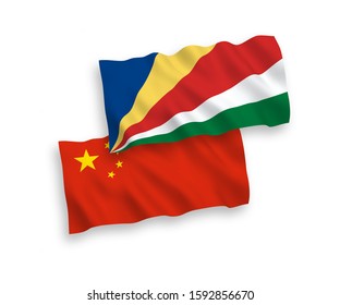 National vector fabric wave flags of Seychelles and China isolated on white background 1 to 2 proportion.