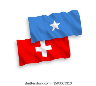 National vector fabric wave flags of Somalia and Switzerland isolated on white background. 1 to 2 proportion.