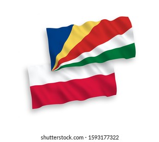 National vector fabric wave flags of Seychelles and Poland isolated on white background. 1 to 2 proportion.