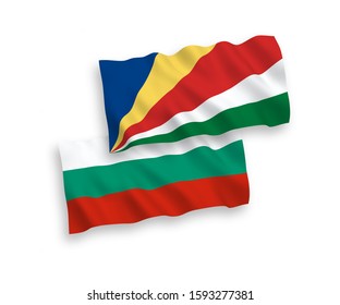National vector fabric wave flags of Bulgaria and Seychelles isolated on white background. 1 to 2 proportion.
