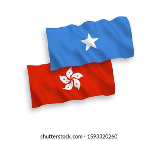 National vector fabric wave flags of Somalia and Hong Kong isolated on white background. 1 to 2 proportion.