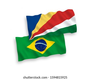 National vector fabric wave flags of Brazil and Seychelles isolated on white background. 1 to 2 proportion.