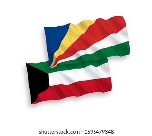 National vector fabric wave flags of Seychelles and Kuwait isolated on white background. 1 to 2 proportion.